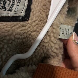 Levy brown leather hooded jacked with fur lining